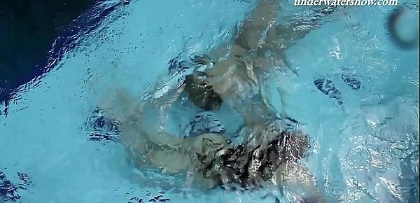  Iva Brizgina and Paulinka hot softcore lesbians in the pool